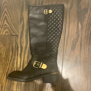 Black leather boots.